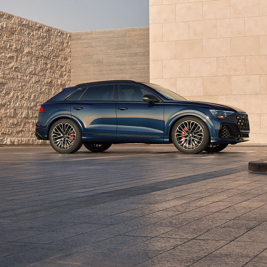 Side profile of the Audi SQ8 parked. 