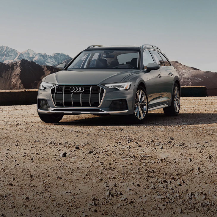 Three-quarter front view of the Audi A6 allroad parked.