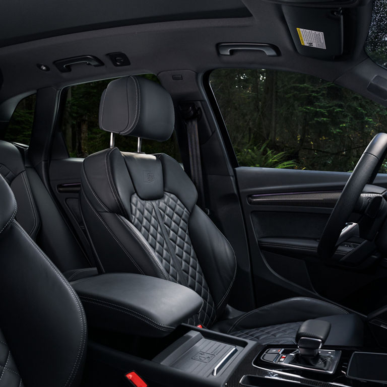 Interior view of the Audi SQ5 with person in the driver’s side window.