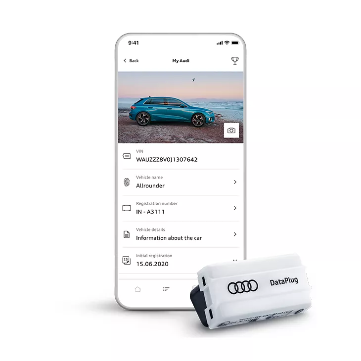 A phone displaying the Audi connect Plug and Play app next to a DataPlug device.