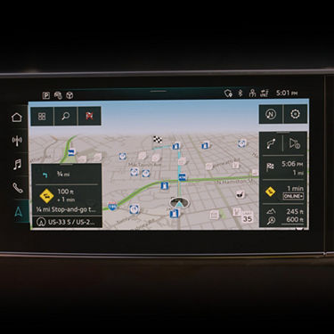 Audi MMI displaying the Traffic Information and route guidance feature.