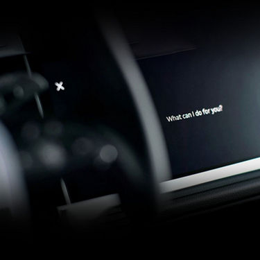 Audi MMI display showing the voice recognition feature.