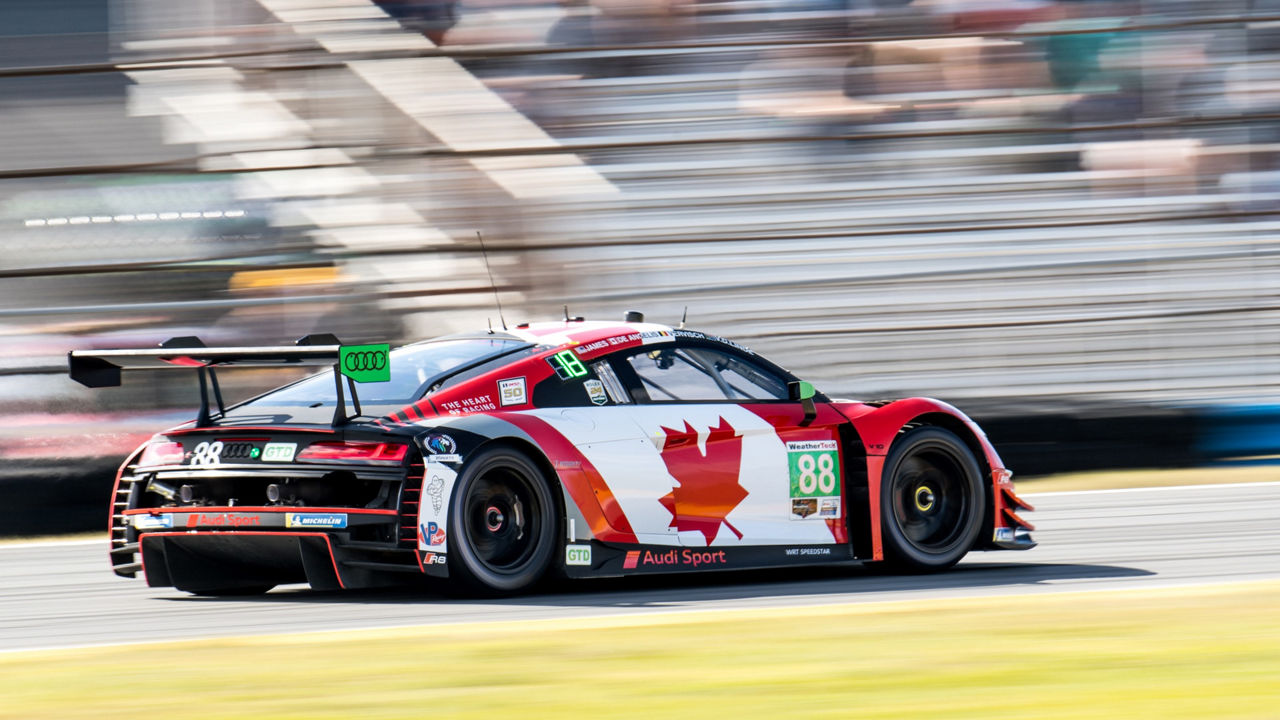 The Audi R8 LMS GT3 race car accelerating. 