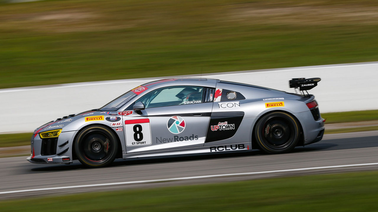 Side profile of the Audi R8 LMS GT4 race car.