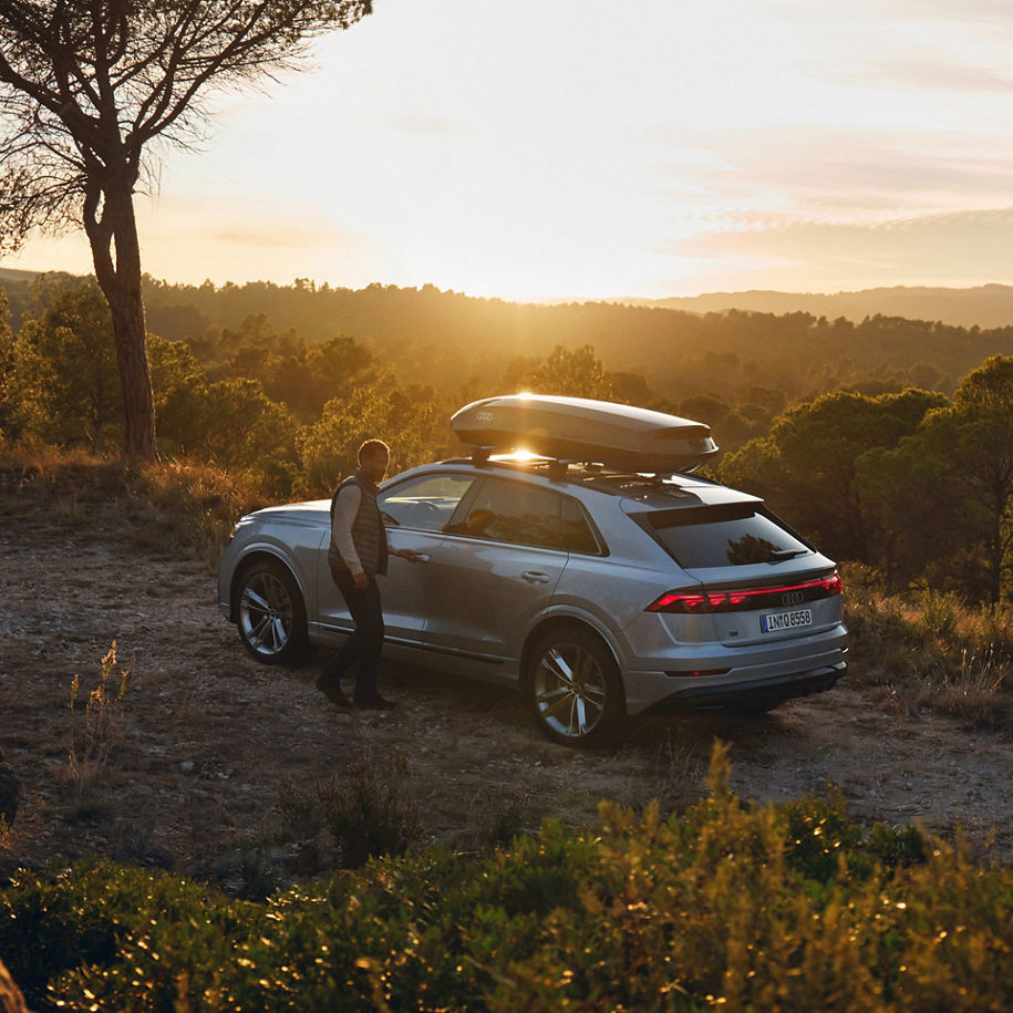 An Audi vehicle with a roof box
