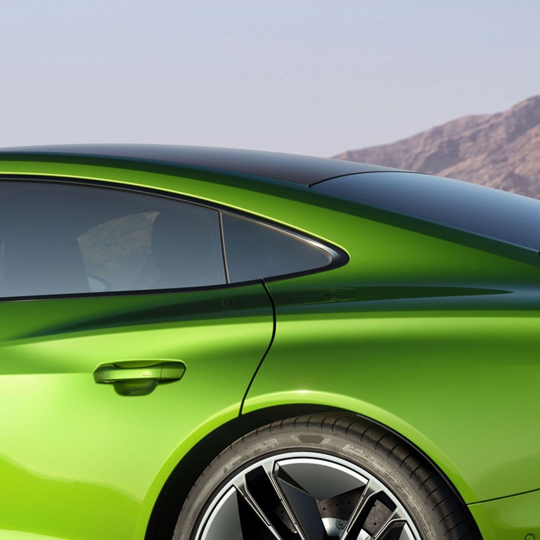 Close-up shot of the rear of a green Audi e-tron GT.