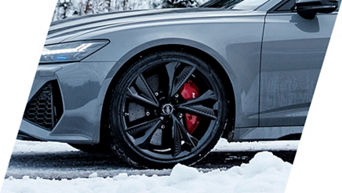 Close up on the wheel of an Audi vehicle. 
