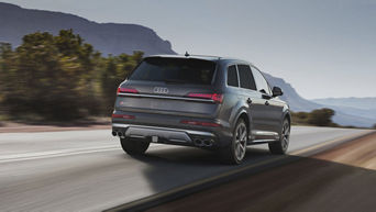 Rear view of an Audi SQ7 accelerating.