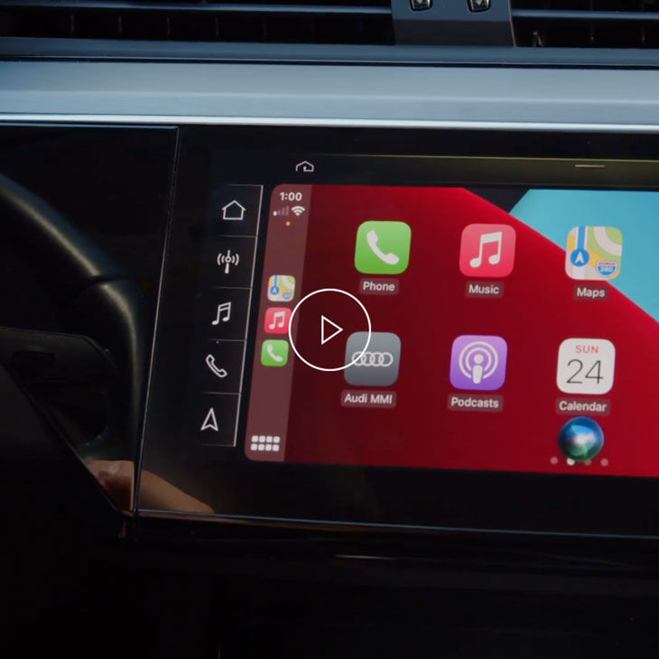  Close-up photo of the Apple CarPlay screen on the Audi MMI display inside an Audi vehicle. 