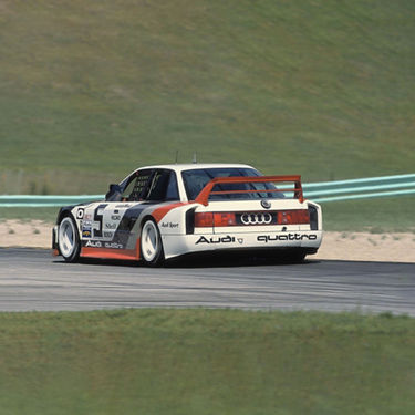  Rear view of an Audi V8 Quattro DTM on the racetrack at the Deutsche Tourenwagen Masters. 