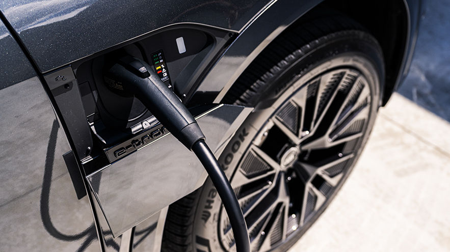 Close-up view of the charging port on the Audi Q8 e-tron.
