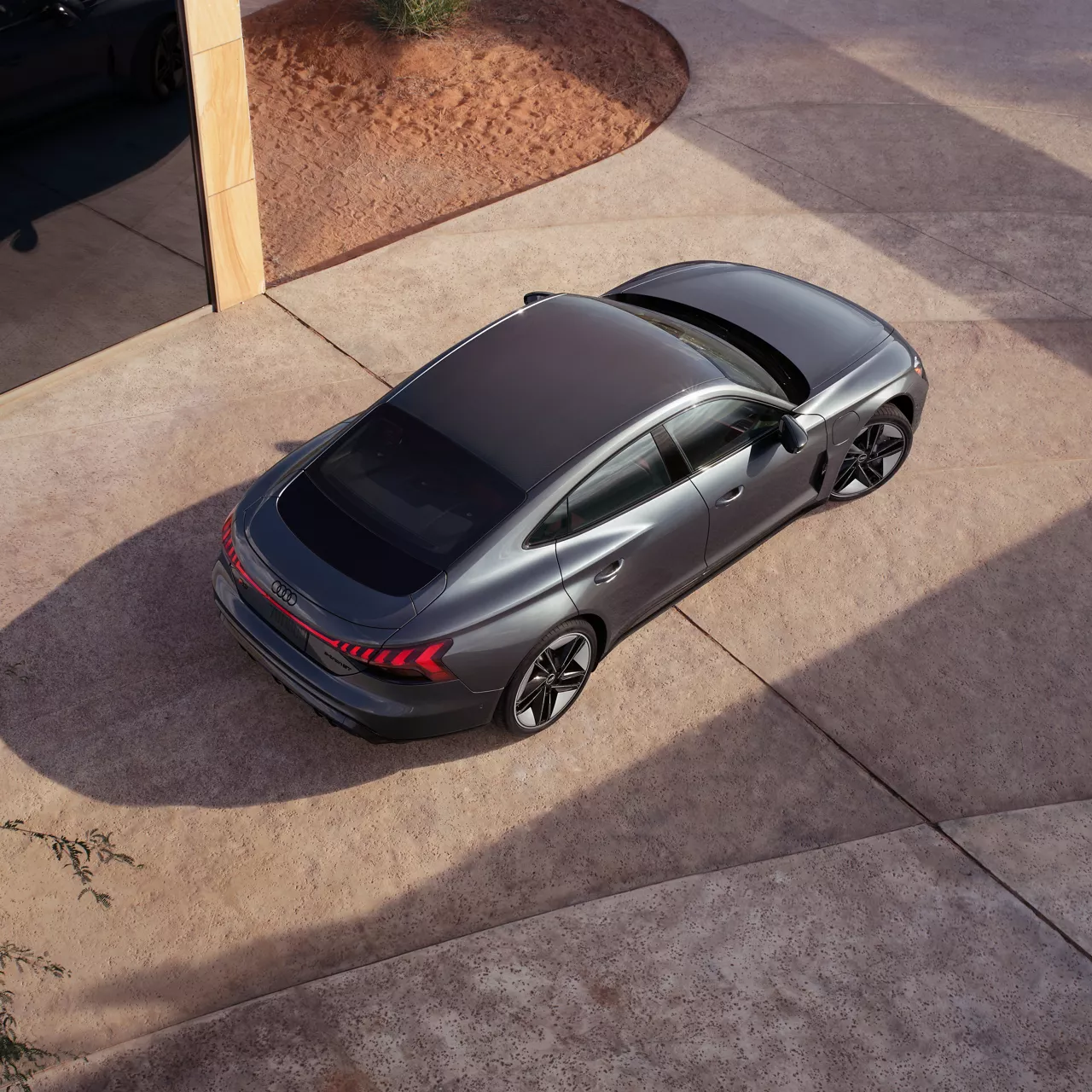 Bird's eye view of a gray Audi e-tron GT.