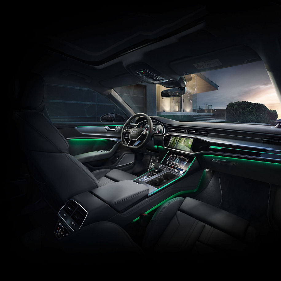 An Audi MMI interior lighting theme that looks like a forest shown within an Audi vehicle.