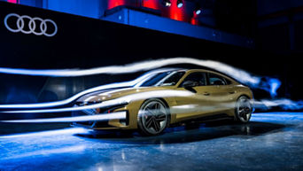 Side view of wind streams flowing over and through the air vents of an Audi RS e-tron GT.