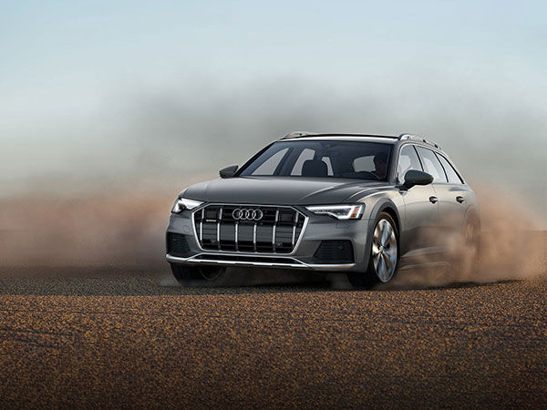 Three quarter view of an A6 Allroad in motion.