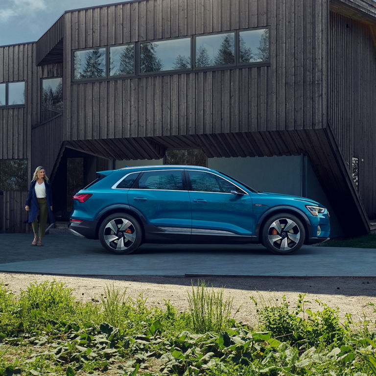 Side profile of the Audi e-tron® parked.