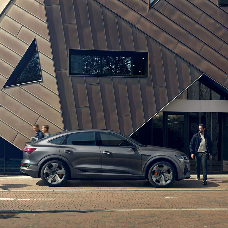 Side profile of the Audi e-tron® Sportback parked.