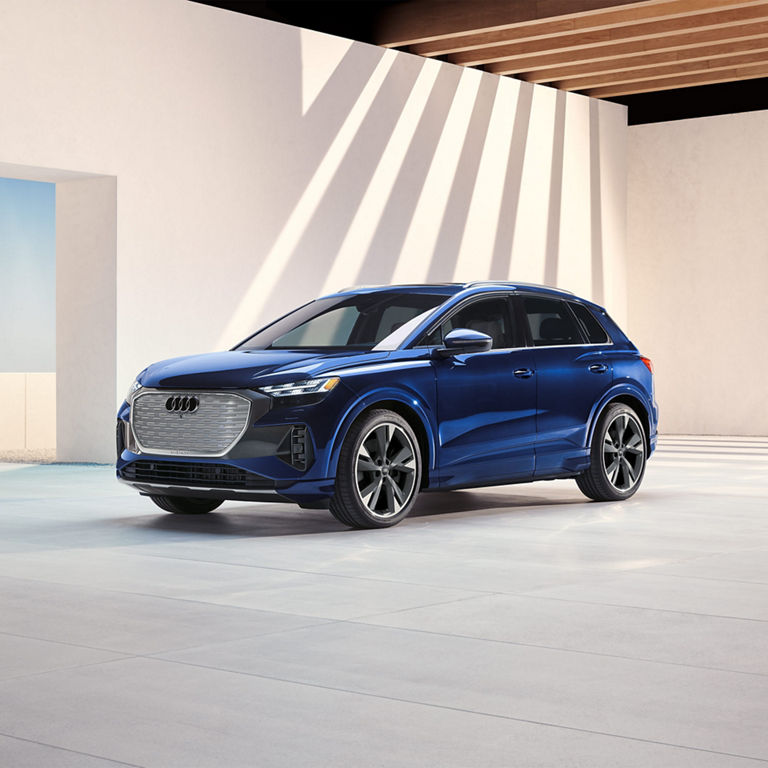 Three-quarter front profile of the Audi Q4 e-tron®.