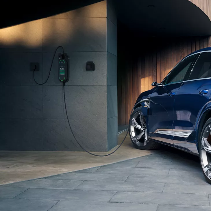 The Audi e-tron® plugged in.