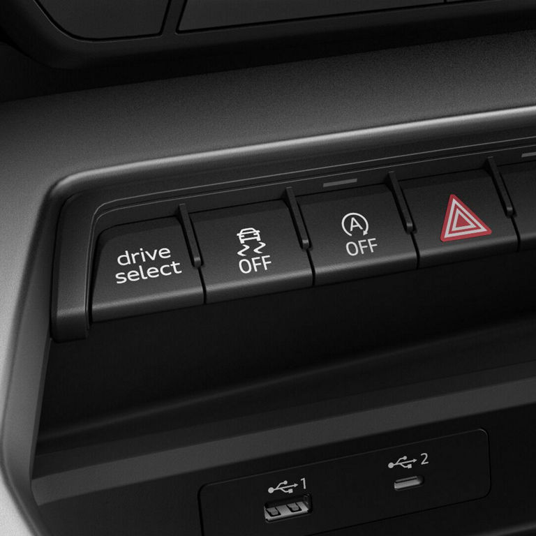 Close-up of the Audi drive select button on the Audi S3.