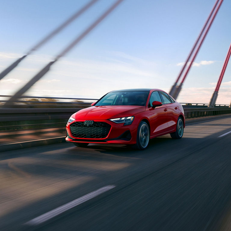 Front 3/4 view of the Audi A3 in motion.