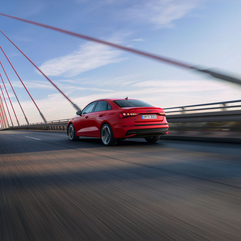 Rear view of the Audi A3 in motion. 