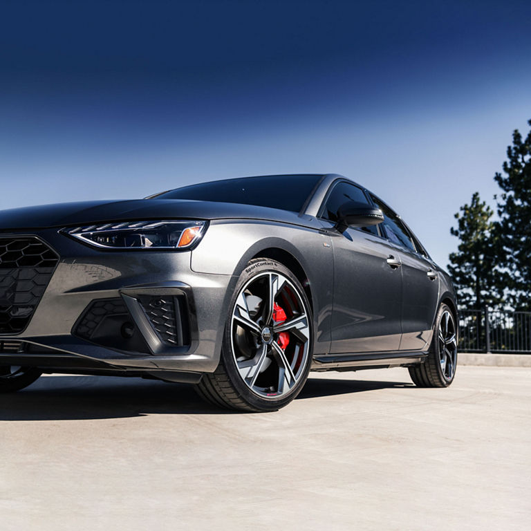 Three-quarter front profile of the Audi A4 Sedan with available Black optic package.