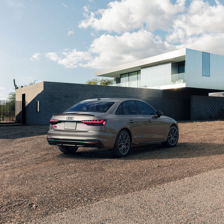 Three-quarter rear view of the Audi S4 Sedan. 