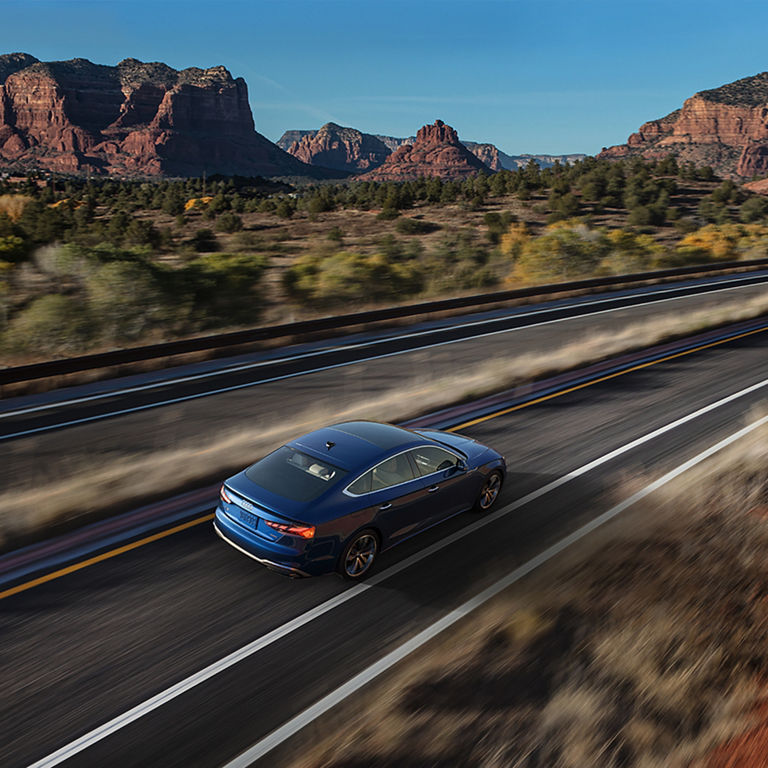 Aerial view of the Audi A5 Sportback in motion.