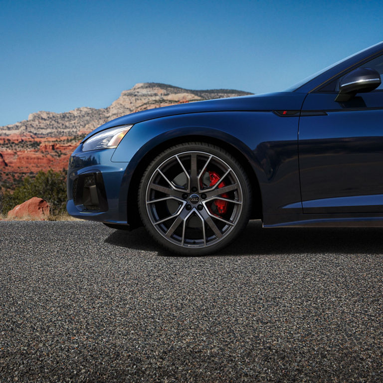 Close-up on the front wheel of the Audi A5 Sportback.