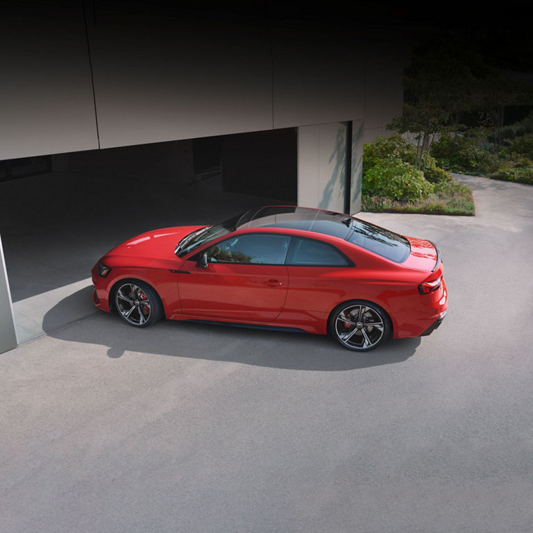 Aerial side view of the Audi RS 5 Coupe.