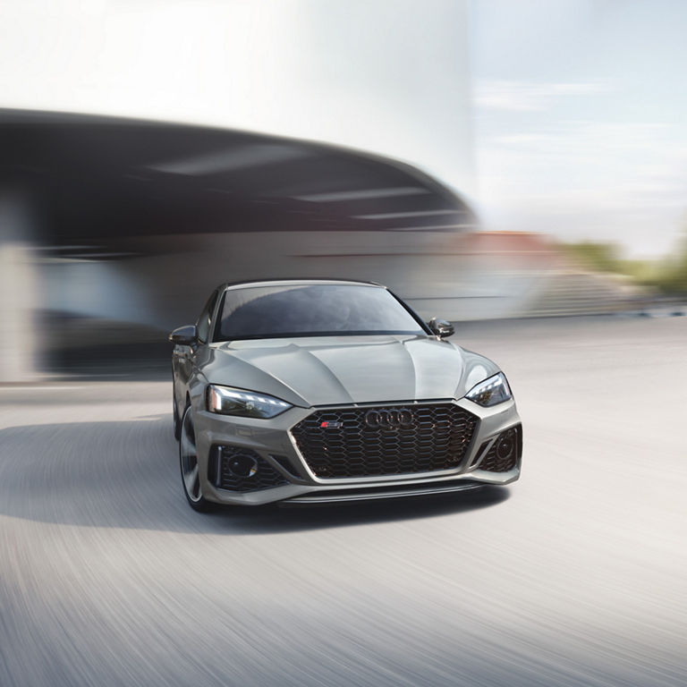 Front profile of the Audi RS5 Sportback accelerating.