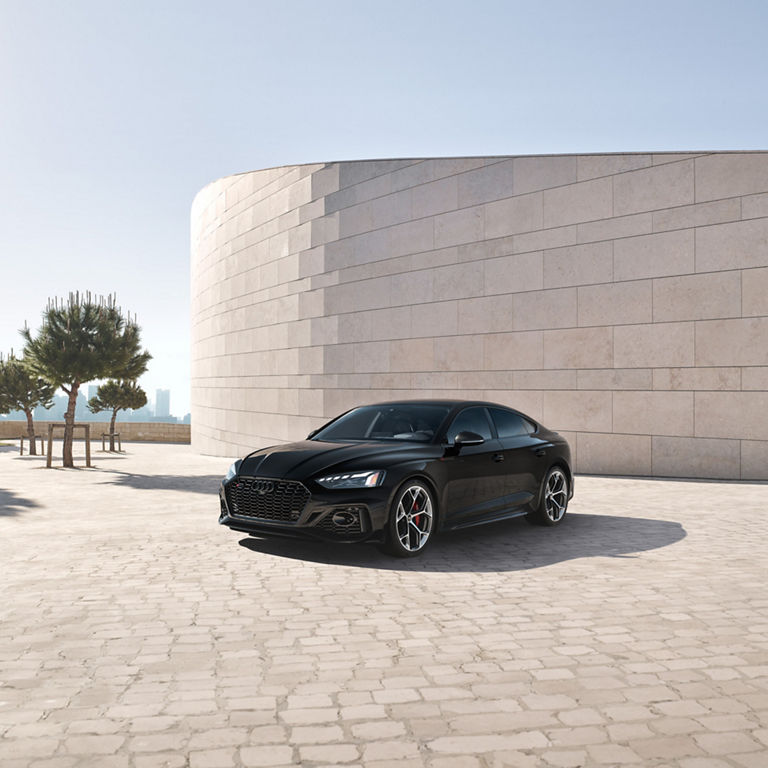 Three-quarter front profile of the Audi RS5 Sportback with Competition package features.