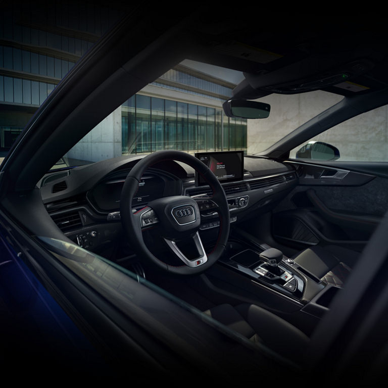 Siège avant, tableau de bord et volant de l'Audi S5 Sportback.
