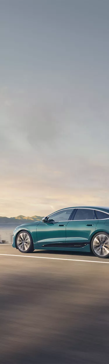 Side view of the Audi S6 Sportback e-tron in motion.