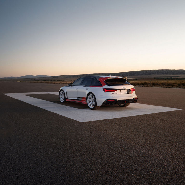 Three-quarter rear view of the Audi RS6 Avant GT parked.