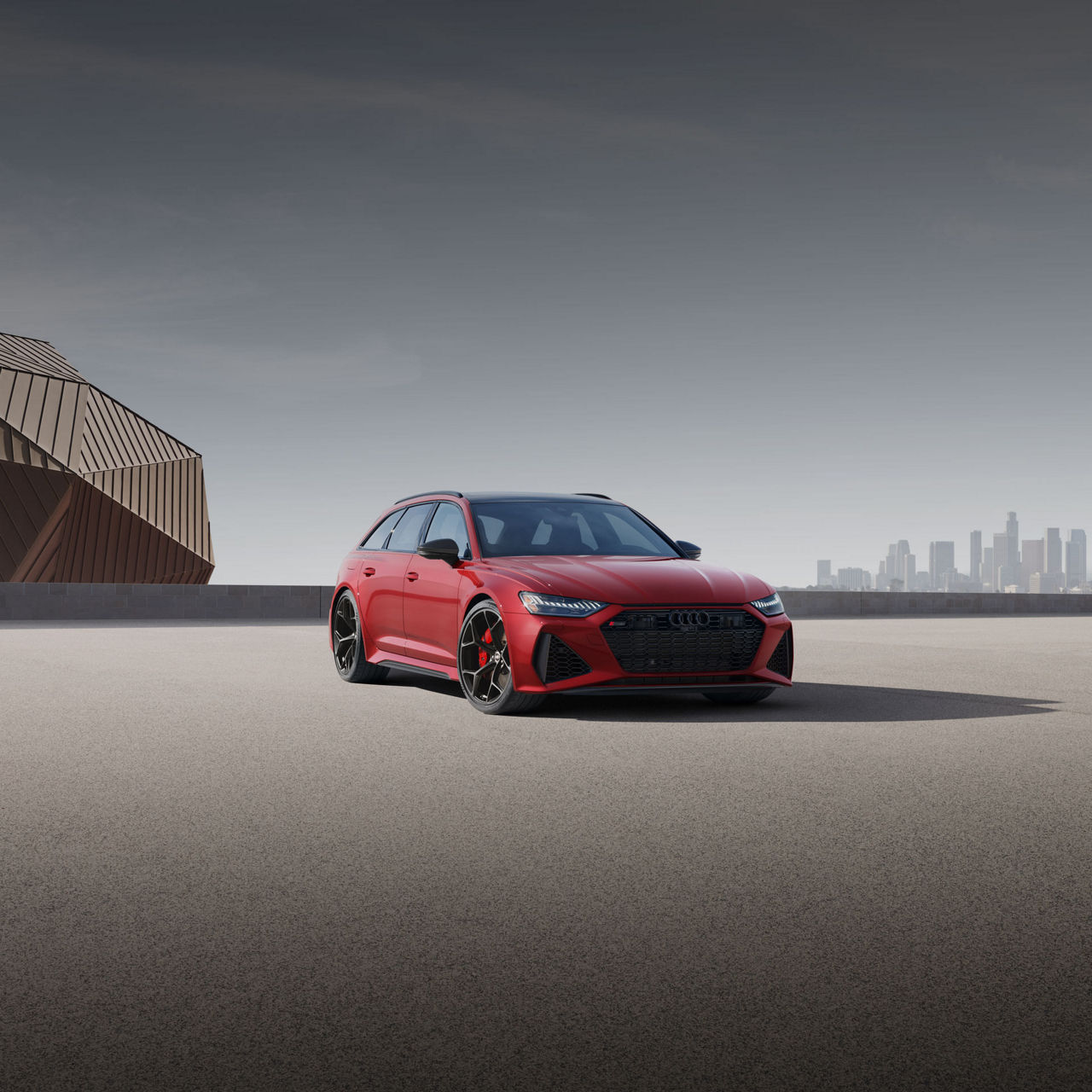 Three-quarter front profile of the Audi RS 6 Avant parked.