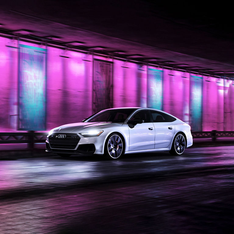 Side profile of the Audi S7 accelerating. 