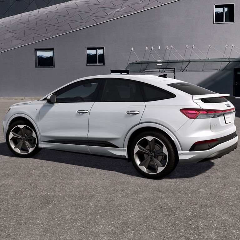 3/4 rear view of the Audi Q4 Sportback. 