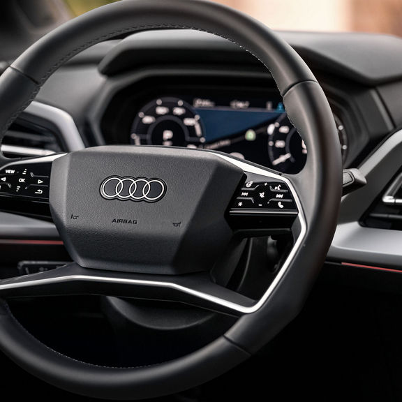 Close-up of the steering wheel inside the Q4 e-tron.