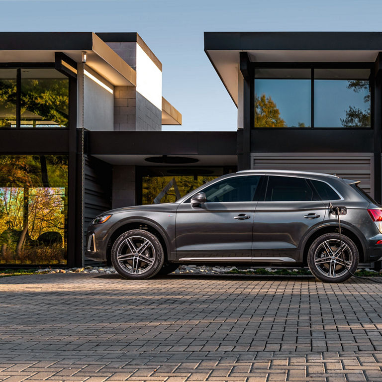 Side view of the Audi Q5 PHEV parked.