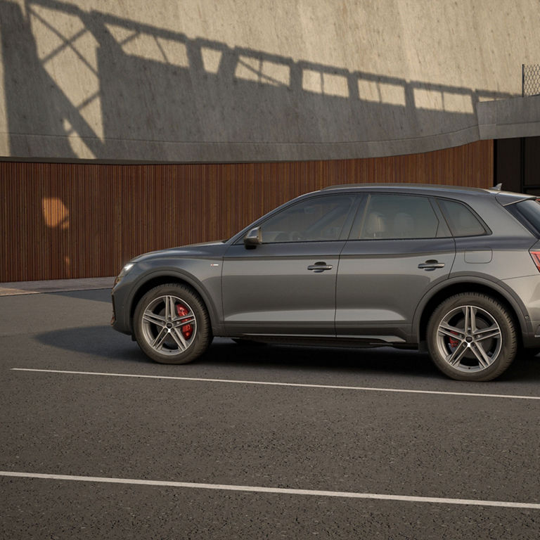 Side view of the Audi Q5 PHEV parked. 