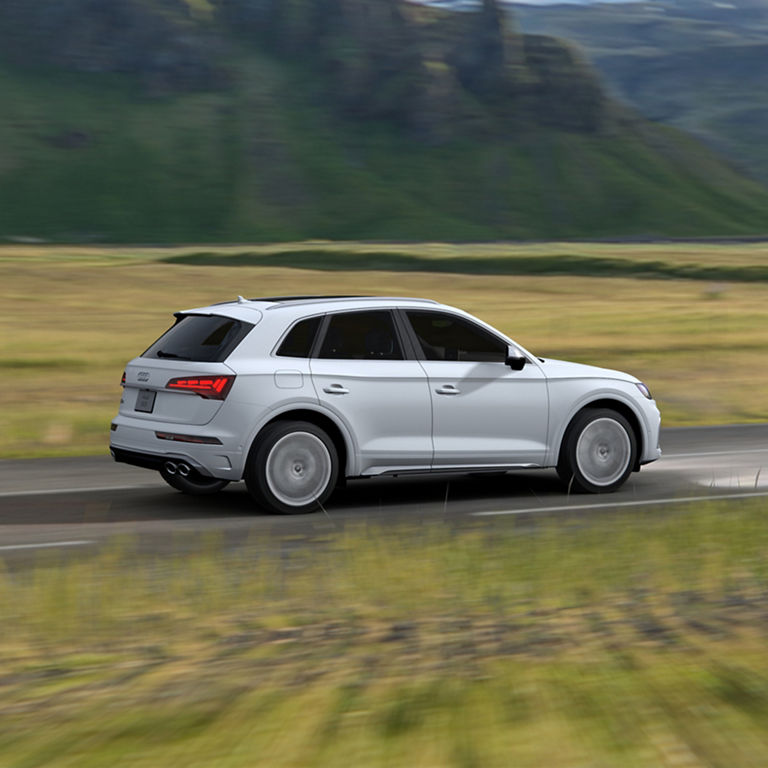 Side view of the Audi SQ5 accelerating.