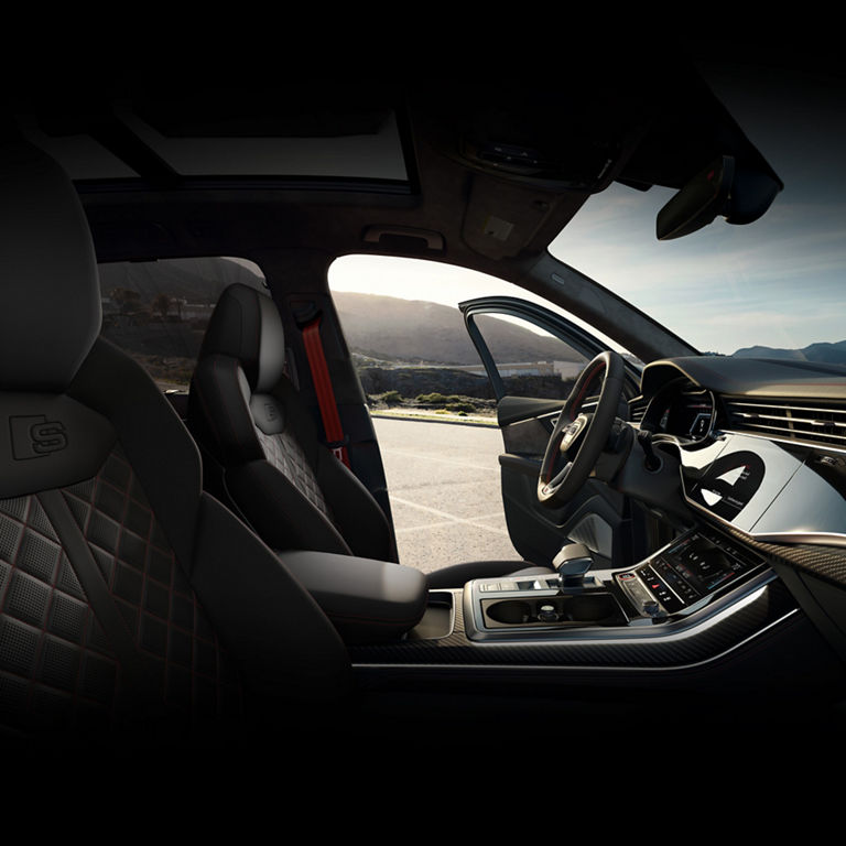 Interior view, showing the sport seats and dashboard, of the Audi SQ7.