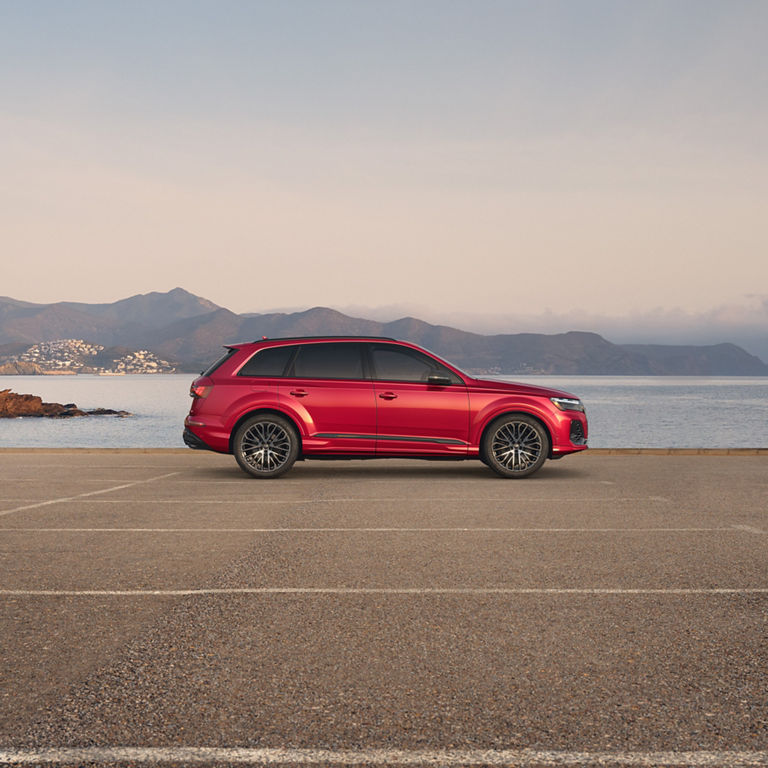 Side profile of a red Audi SQ7.