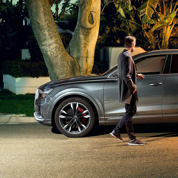 Close-up of the Audi SQ8 side view mirror.