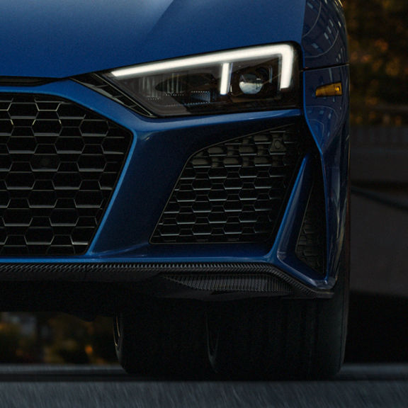 Close-up of the LED headlight on the Audi R8 Coupe.
