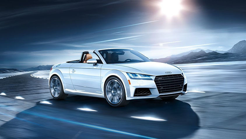 Close-up of the Bang & Olufsen® speakers in an Audi vehicle.