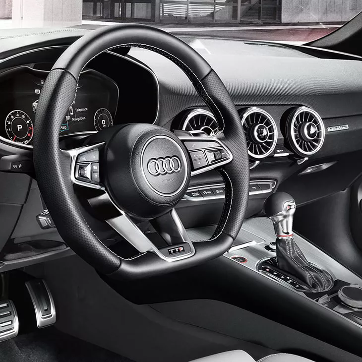 View of the driver-centric cockpit in the Audi TTS Coupe.