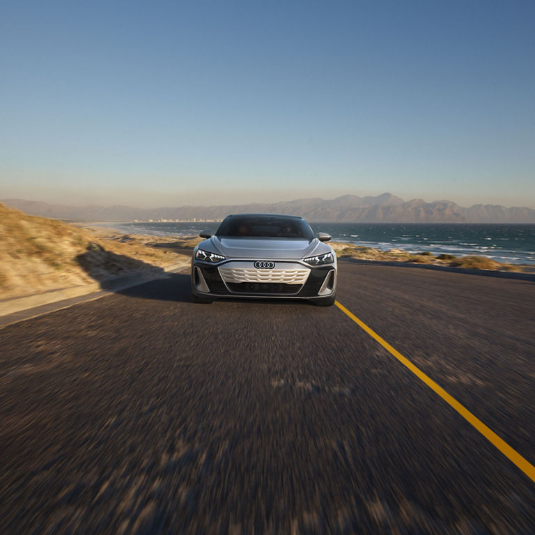 Front profile of the Audi S e-tron GT accelerating. 